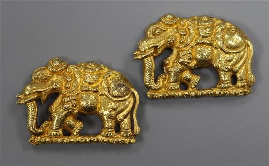 A pair of Indian? yellow metal elephant appliques, 33mm.